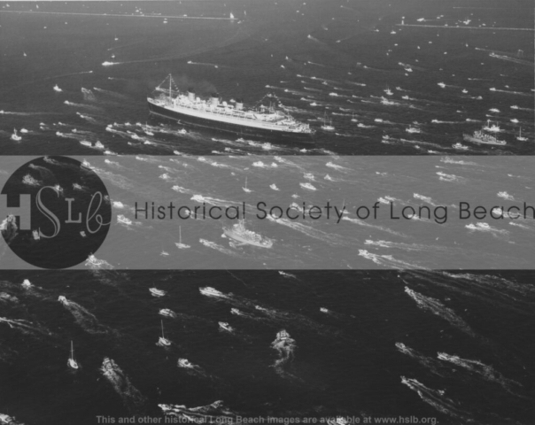 Queen Mary escorted into Long Beach, 1967