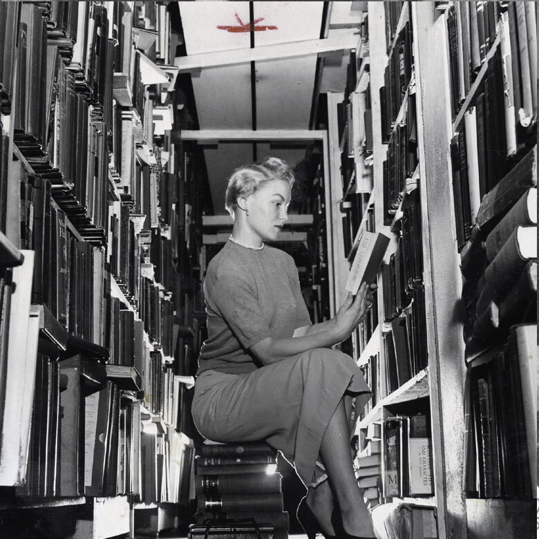 HSLB photo collection woman reading in library