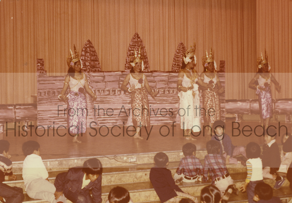 Image of Leng Hang (center) with four other dancers performing the Apsara Dance (Robam Tep Apsara) at Long Beach Wilson High School in 1976.