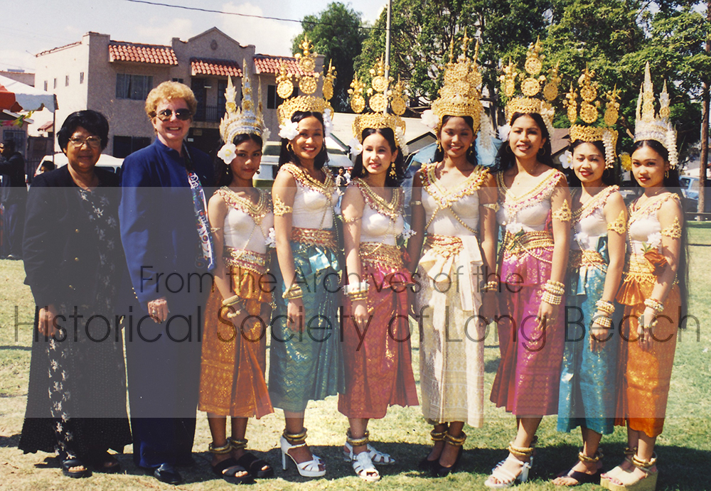 Leng Hang (far left) stands next to Long Beach Mayor Beverly O'Neill (1994-2006) with dancers in the troupe she founded through the Cambodian Arts Preservation Group.