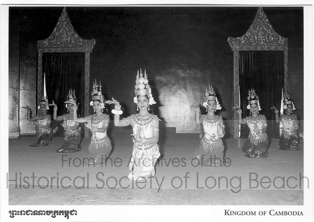Modern Cambodian classical dance dress and hand movements are based on the images carved on the temple walls of Angkor Wat and other temples. The image of Cambodian classical dancers on this postcard highlights the dance form's significance to Cambodian culture and history.