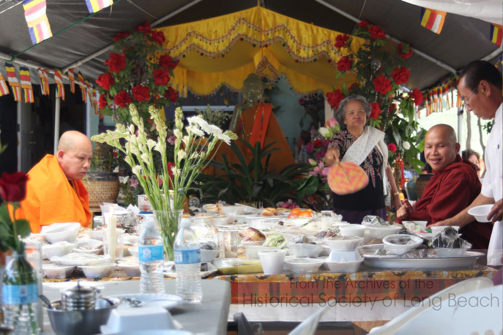 2012 Pchum Ben observance at Wat Samaki in Long Beach, CA. Food brought to the temple for the ancestors is shared with the monks. A sample from everything brought by the families is placed on a table for the monks and ancestors to enjoy.