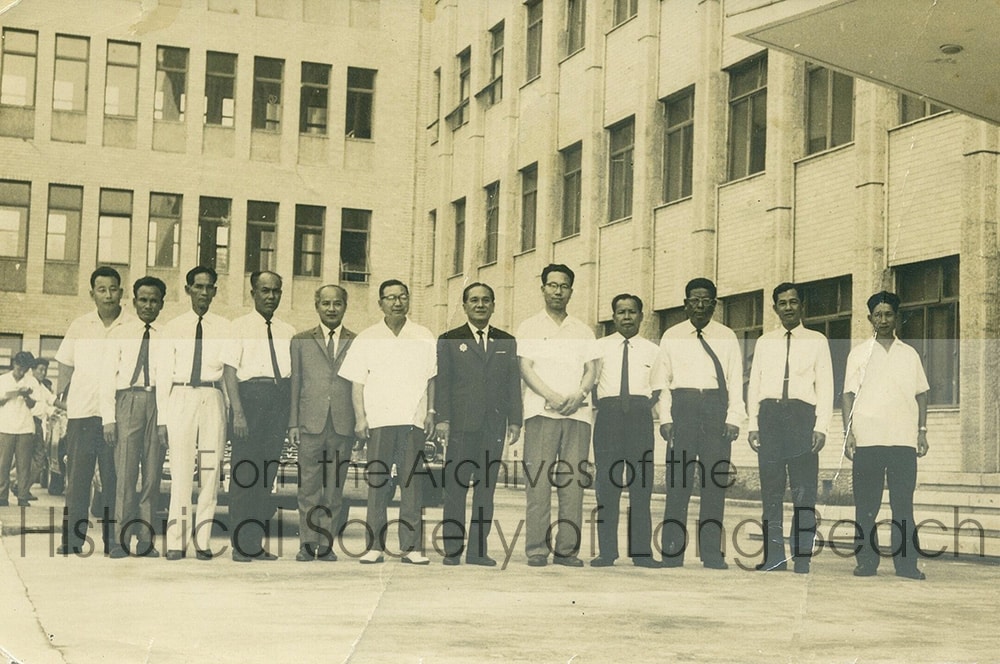 Bokanika Kan’s grandfather, Chhung Pen (third from right), shown with a delegation of Cambodian electors. Location of photo is unknown. c. 1950.