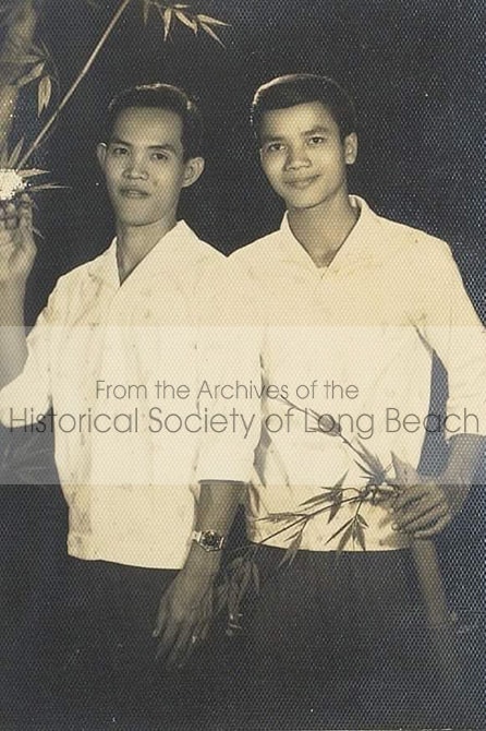 Bokanika Kan’s father, Bo Kan (on the right), and his best friend. Friend’s name and location unknown c. 1950.
