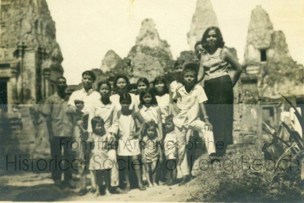 Bokanika Kan’s mother, Borin Kan (far right), and her father, Bo Kan (second from left), visiting Angkor with extended family c. 1960.