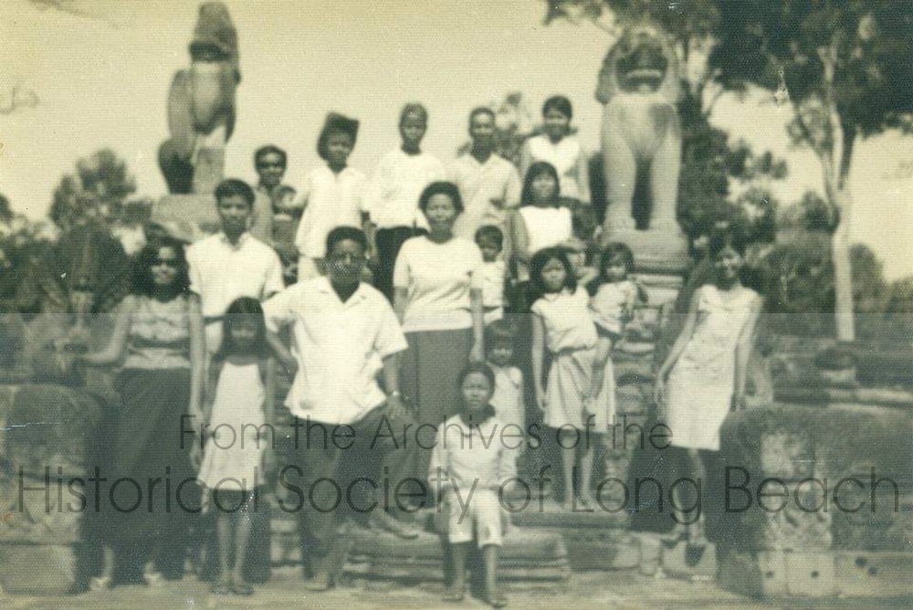 Bokanika Kan’s mother and father, Borin and Bo Kan (far left) with extended family at Angkor Wat before Bokanika was born c. 1960.