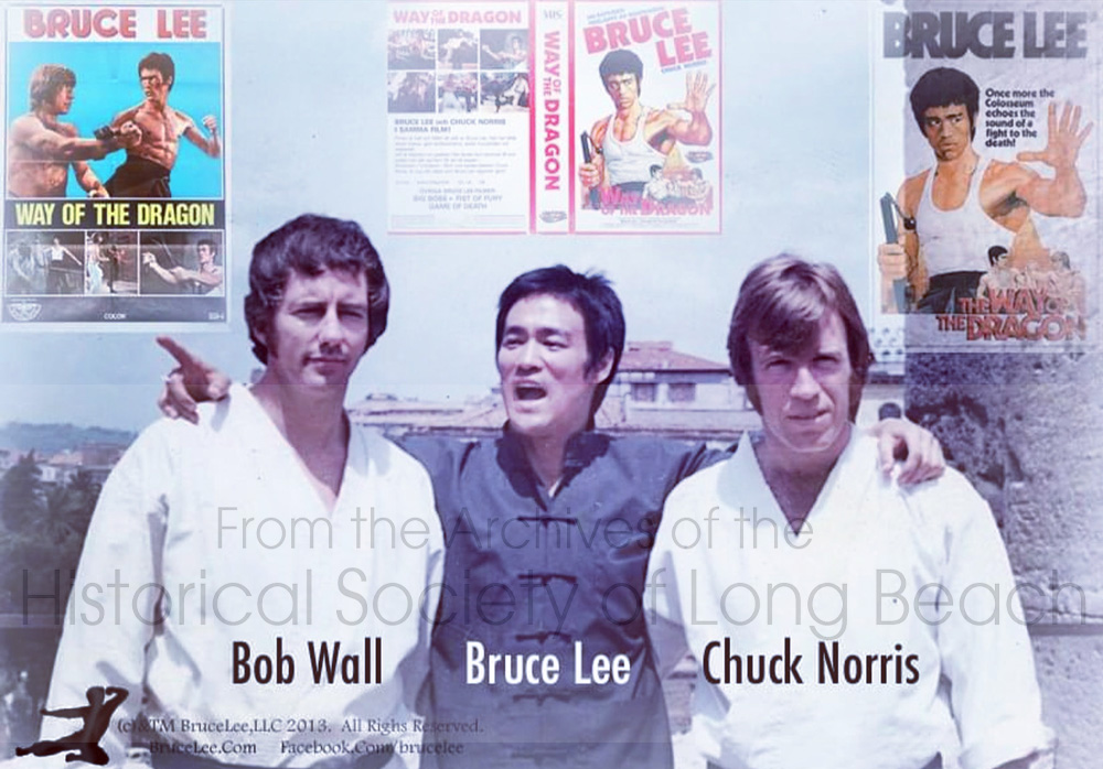 From left to right are Rob Wall, Bruce Lee, and Chuck Norris, in front of movie posters for “The Way of the Dragon” (released in the U.S. as “Return of the Dragon), 1972. Clark became close with all three, especially Robert Wall, who was Clark’s daughter’s godfather.