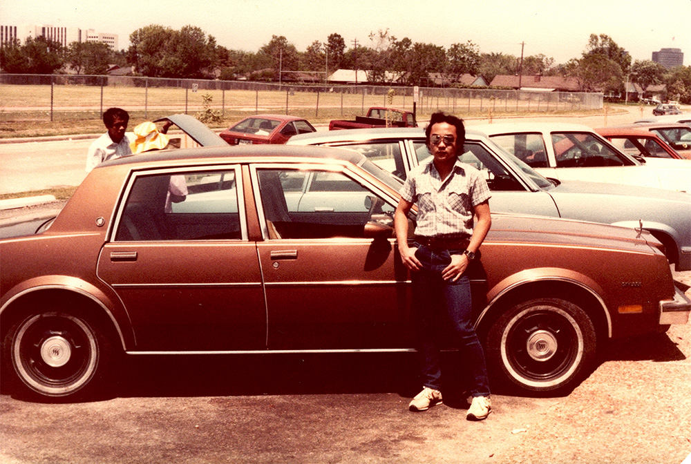 Dan Durke standing in front of his cousin’s red Impala in Long Beach, CA in 1983. This was the first car his cousin bought. The cousin sponsored Dan to the U.S.