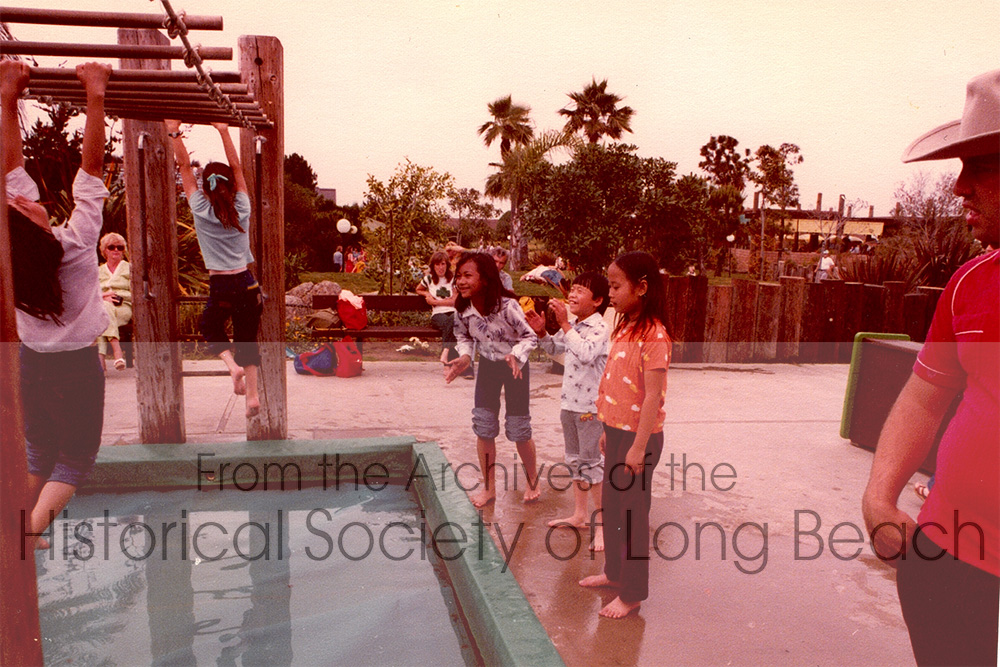 Danielle Khim with classmates at a playground, perhaps at the San Diego Zoo, c. 1981. Danielle is not sure how old she is, but perhaps between 11 and 12 years old. Danielle remembers there were many Laotian, Vietnamese and Cambodian refugee children at her school. She recalls being bullied and getting into trouble for fighting.