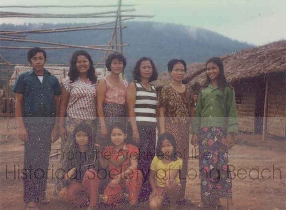 Janet Vanniroth (center, front row) with some of the staff “mothers” who worked in the orphanage center at the Khao-I-Dang refugee camp, Thailand, 1980. Janet’s mother, Vannsath Nguon, is 3rd from right wearing the black and white striped top.
