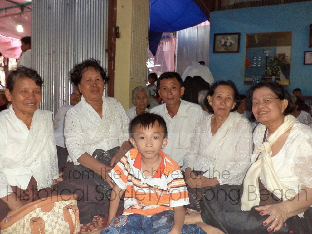 Some of Janet Vanniroth’s family at her Grandmother’s 100 day memorial service in Kandal Province, Cambodia, 2012. From left to right: Janet’s mother’s cousin; her mother’s sister, Sovanda Nguon; unidentified boy; her maternal uncle, Makara Nguon; her mother’s stepmother, YeYah; and her mother, Vannsath Nguon.