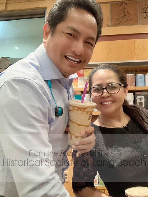 Janet and her husband, Dara Vuth, at a Coffee Bean and Tea store in Long Beach, CA, 2019. Dara’s mother died in January 2019 and he became a monk for a short time. After a parent’s death, it is customary for the son or son-in-law to shave his head and become a monk for a short period of time. The merit he earns by doing this goes to the deceased. Dara’s hair is growing back.