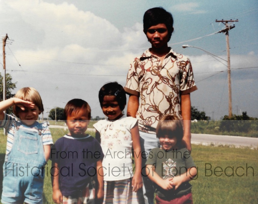 Julie Daniels with two of her brothers, in Coal City, Illinois 1980. From left to right: unidentified boy, Julie’s brother, Todd; Julie Daniels; her brother, Logan, unidentified boy.