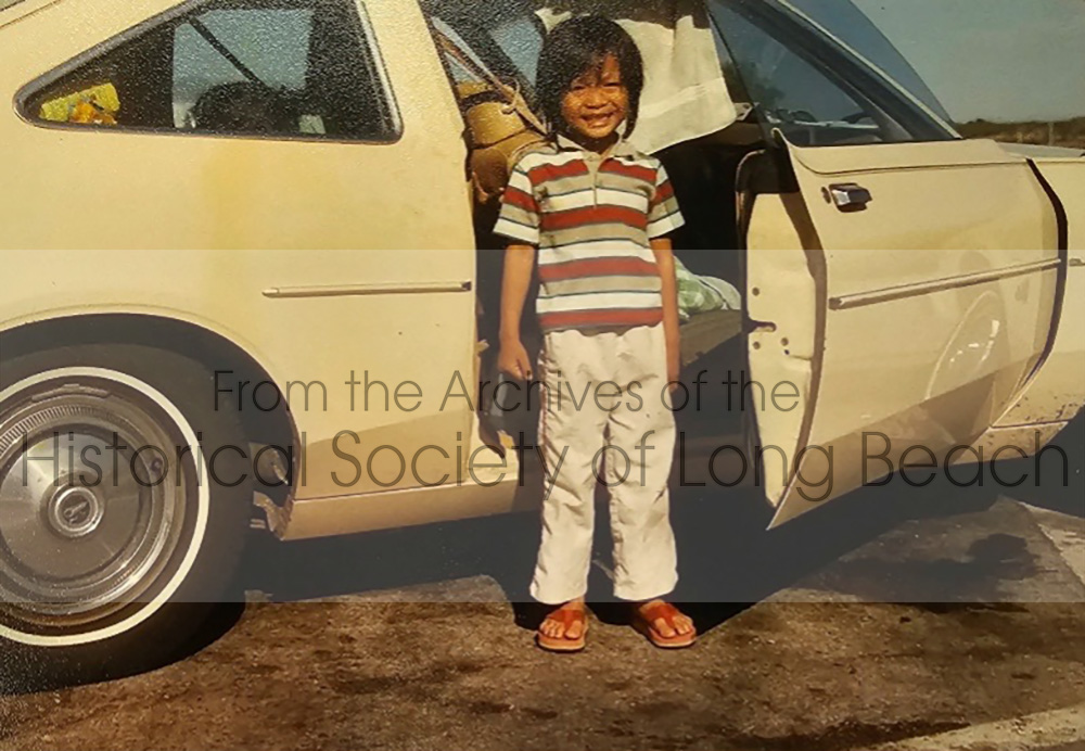 Julie Daniels’ brother, Todd, standing in front of the car they used to drive from Fort Worth, TX to California in 1987.