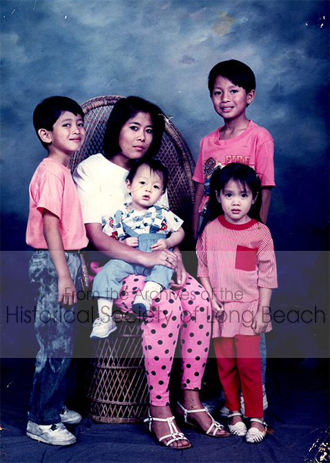 Studio portrait of Julie Daniels with her siblings in Long Beach, CA 1990. Back row, left to right: Julie’s brother, Sam; Julie; her brother, Todd. The other children are unidentified. She stole money from her mother to have this portrait done.