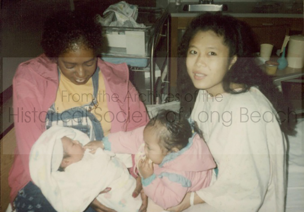 Julie Daniels after giving birth to her son, Herbert in Knoxville, TN, 1992. Julie’s daughter, Joleena, is in Julie’s lap.