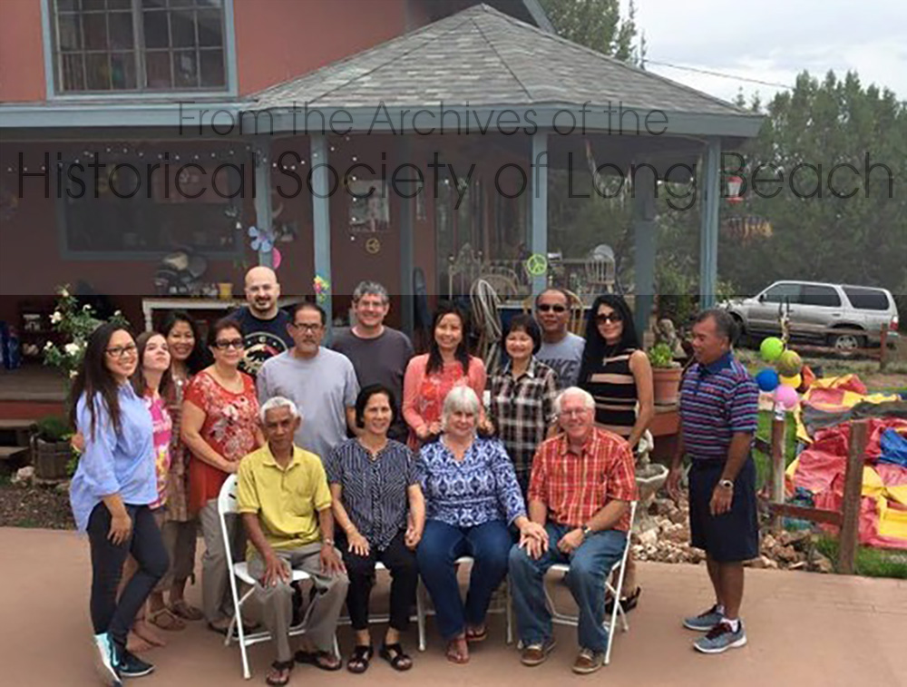Julie Daniels (standing, 3rd from left) at a surprise 60th birthday party for her family’s sponsor, Melody Fisher (front row, 2nd from right), in Prescott, AZ 2016. Melody and Bill Fisher (front row on right), sponsored Julie’s family and several others from Cambodia. Some of these families are in the photo.