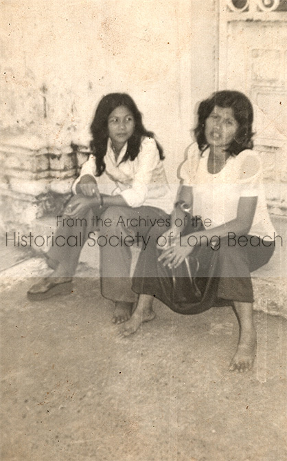 Kam Lou Lopez (left) in her village southeast of Phnom Penh, near the Mekong River, Cambodia 1980. Kam does not remember who took the picture or the occasion, but because she was wearing a nice blouse, she thinks it may have been a celebration. The woman on the right was a neighbor, but Kam does not remember her name.