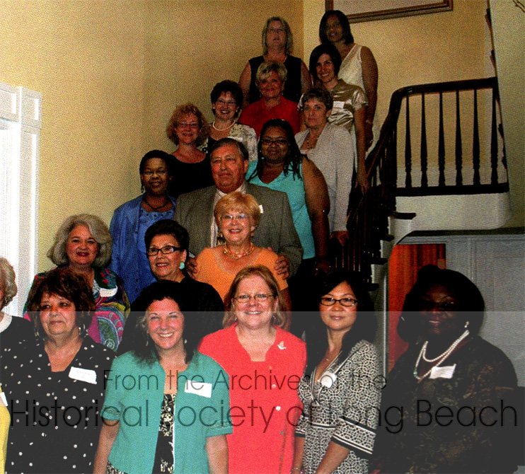 Kam Lou Lopez (front row, 2nd from right), was a 2008 recipient of the Sunshine Peace Award, funded by the Buffet family of Wilmington, North Carolina. Kam was among twenty awardees selected from 150 nominations. The award seeks to honor recipients for their work to bring hope, healing and safety to survivors of Domestic Violence. The foundation brings recipients to Wilmington, NC to receive their awards.