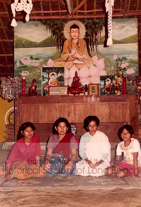 Monorom Neth with family in a temple in Khao-I Dang refugee camp in Thailand 1979. From left to right: sister, Somealy Neth; Monorom’s mother, Om Van; unnamed person, Monorom Neth.