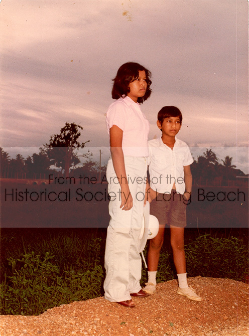 Monorom Neth and his sister, Somealea, dressed in their best outfits hoping to go to the U.S. at Chonburi Refugee Processing Center, Thailand, 1981.