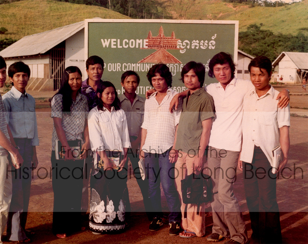 Monorom Neth’s sister, Somealea (in white blouse and black skirt), at the Philippine refugee processing center 1982. After being accepted for sponsorship to a third country, refugees were sent to processing centers in the Philipines. There they would study the language and social conventions of the host country.