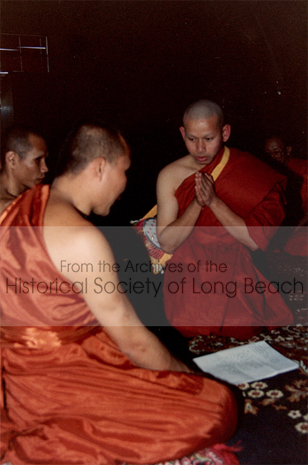 Monorom Neth’s brother, Sakarl Neth, during his ordination at the Khemara Buddihikaram Cambodian Buddhist Temple in Long Beach, CA, 1988 or 89. Sarkarl is reciting the rules to become a monk.