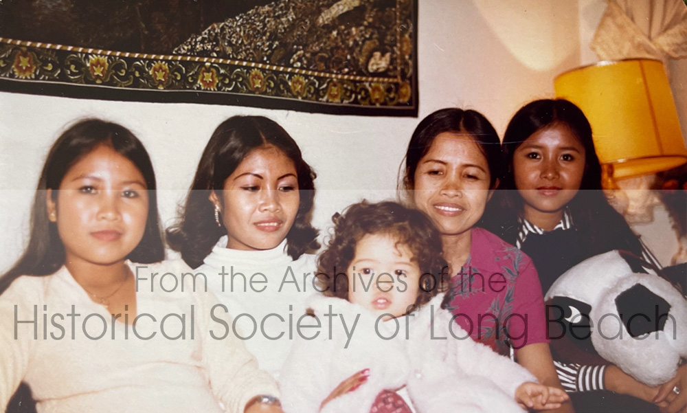 Sithy Yi with her family in her uncle’s home in Long Beach, Ca in 1982. From left to right are her youngest sister, Sitheavy Yi (Jennifer Diep); Sithy; her uncle’s daughter, Sheila Tran; her mother, San Thi Tran; and middle sister, Sithea (Sithea San). Sithy is not sure, but it looks like they had gathered for a holiday celebration. The family lived with their uncle for about one year. Sithy was probably about 15 years old and was attending 9th grade at Jefferson Middle School in Long Beach.