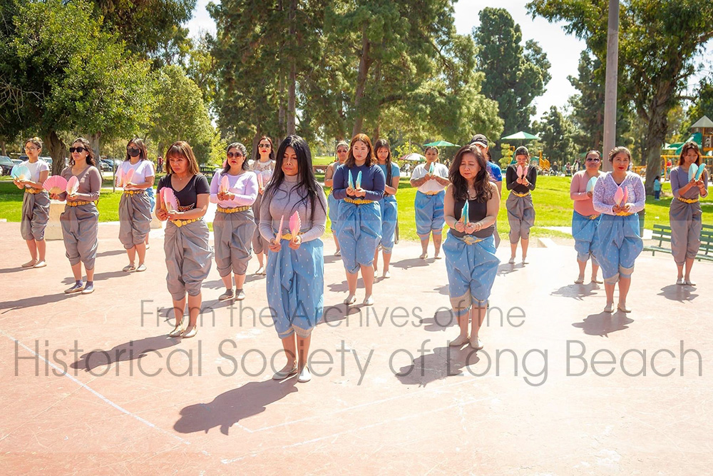 Sithy Yi (center front) with volunteers for the Stop The Hate with Love campaign in Long Beach, CA 2023. The troupe was practicing their parade formation for the 2023 Cambodia Town Parade and Culture Festival. Sithy was assistant coordinator for the event and oversaw rehearsals, costuming, and hair.